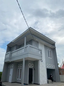 RUMAH DI TENGAH KOTA