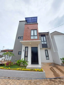 Rumah minimalis desain rooftop murah dekat pintu tol cisalak