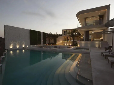 Experience unparalleled luxury in this exquisite two-story villa