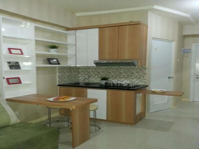 Apartemen green pramuka city 2 kamar full furnished include maintance