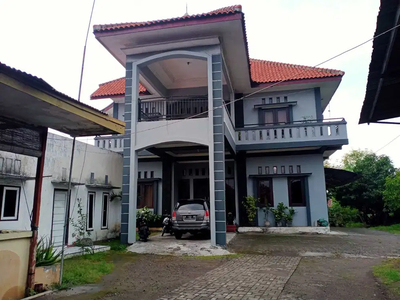 Rumah Mewah 2 Lantai + 2 Ruko Nol Jalan Nasional Dijual Seharga Tanah