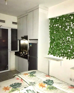 The green pramuka city apartemen studio furnish sewa bulanan