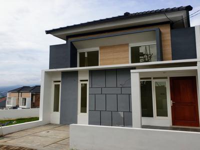 Rumah villa modern batu kota