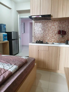 Sewa Apartemen tahunan Studio full Furnished unit CANTIK