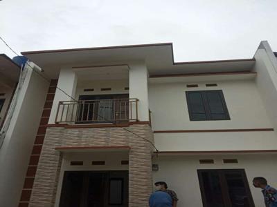 Rumah desain modern 2 lantai Dp 0% bebas biaya apapun