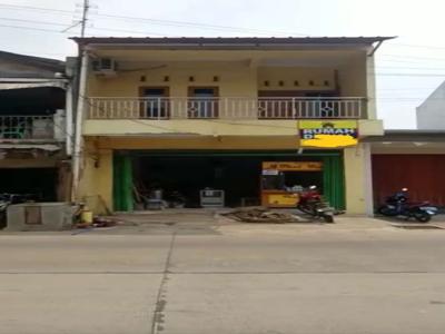 Djual rumah+kios di jln raya perum pondok gede,kota bekasi