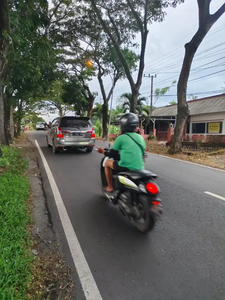 Tanah ada Bangunan Rumah makanya di jln Raya