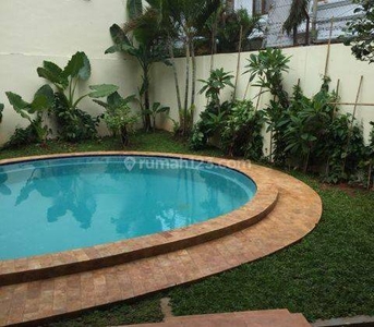 A 2 Storey, 4 Bedroom, Compound House Located In South Jakarta With 4 Bathrooms, A Pool And A Yard.