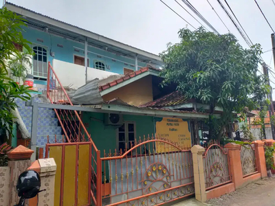 Jual rumah beserta kosan 3 pintu dekat Kampus Muhammadiyah