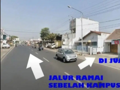 Rumah pinggir jalan raya