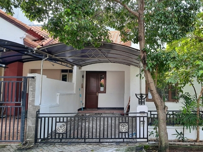 Rumah Taman Puspa Raya Citraland Surabaya